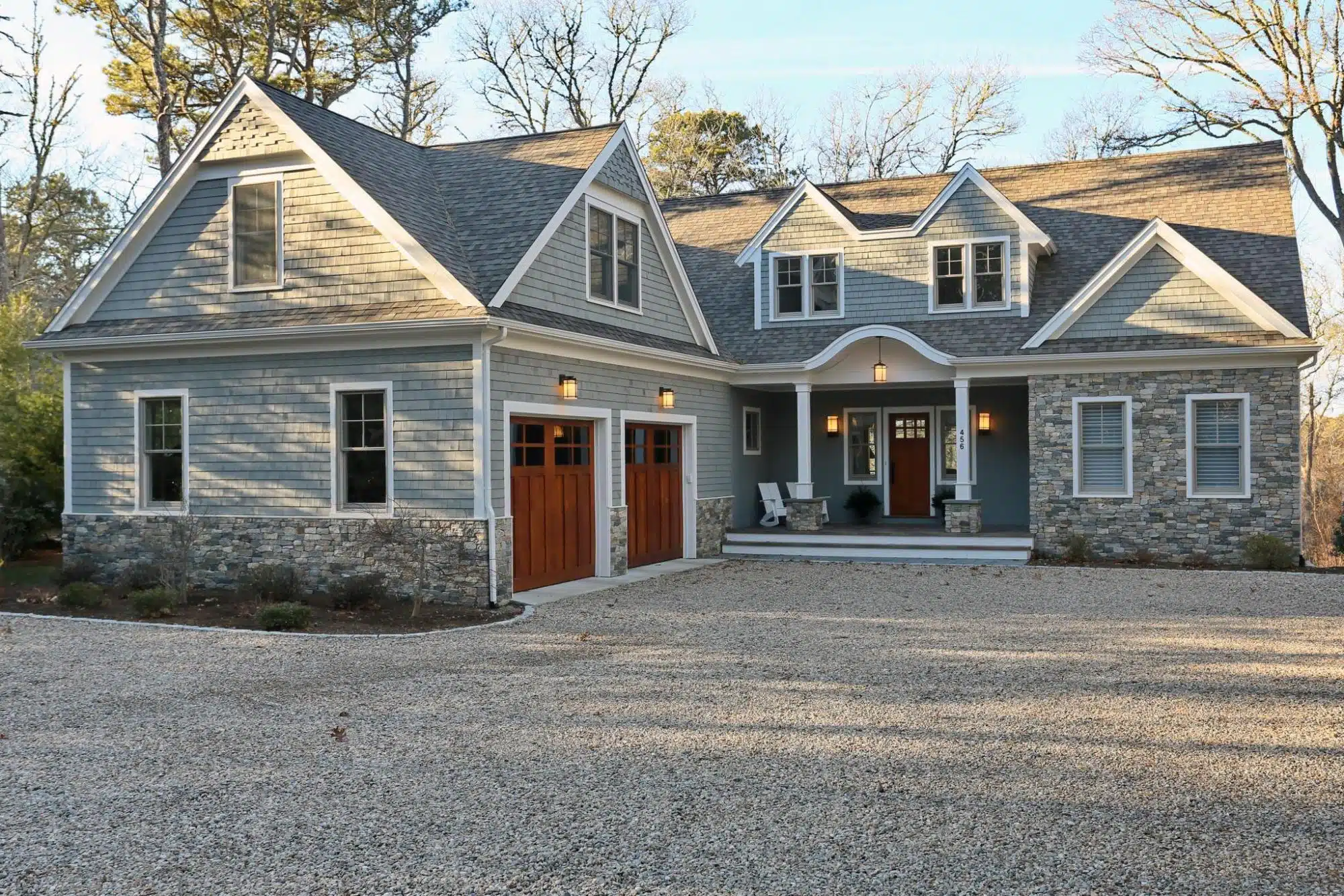 Porch and garage exterior of Encore’s new home on Long Pond