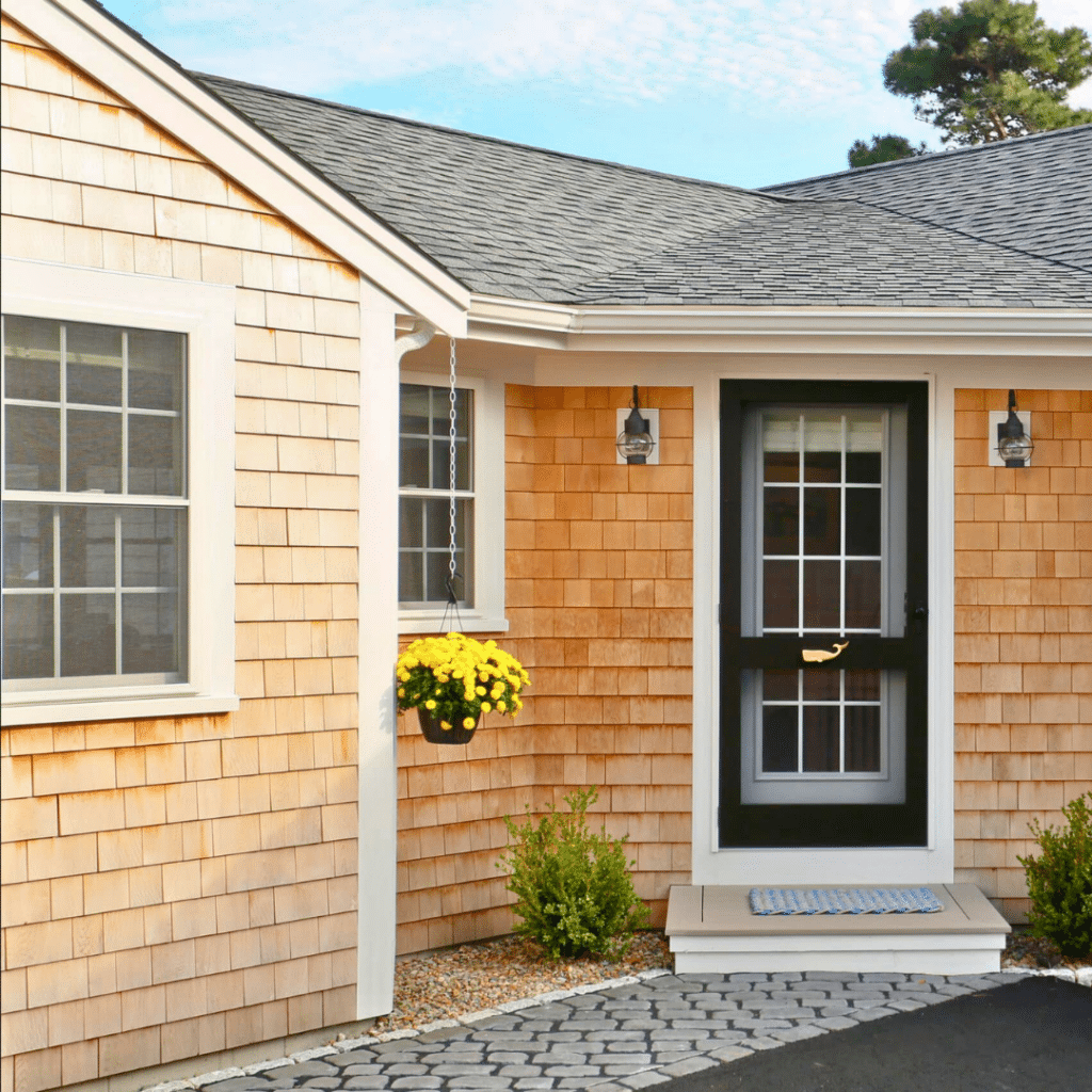 Siding Options for Cape Cod Homes_ Hardie Plank on the Front and Cedar Shingles on the Sides