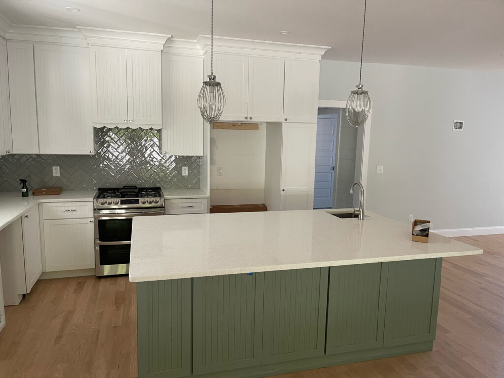 Kitchen with an island at Nestled in Harwich Port